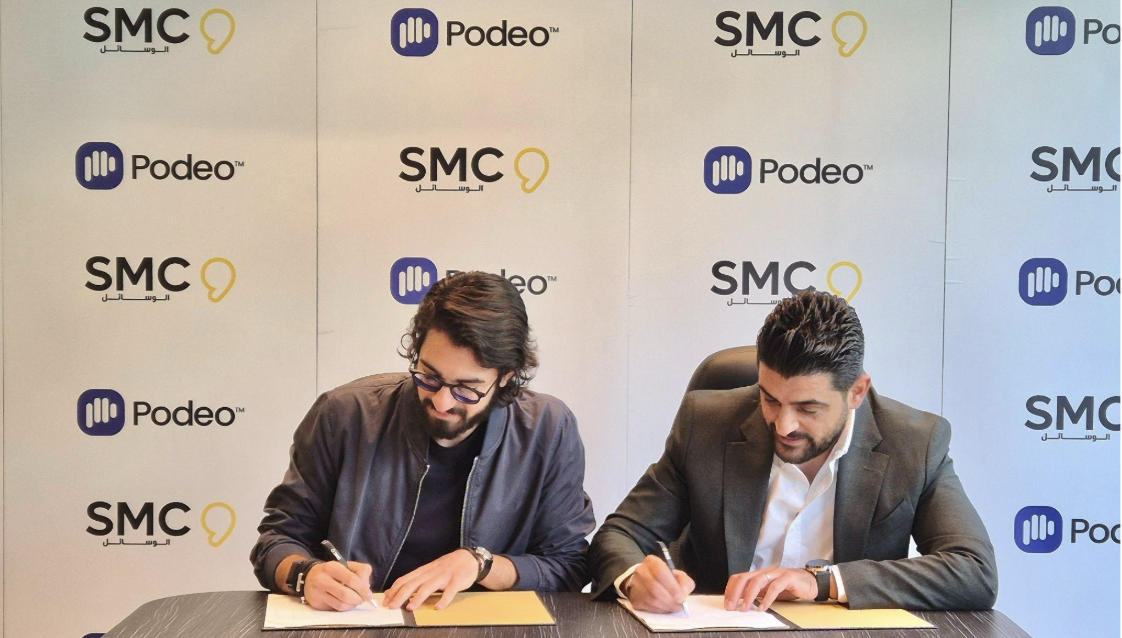 Stefano Fallaha, CEO & Founder of Podeo, Michel Bayeh, Media Executive Director at SMC Group signing the partnership agreement