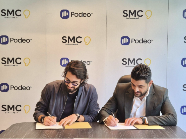 Stefano Fallaha, CEO & Founder of Podeo, Michel Bayeh, Media Executive Director at SMC Group signing the partnership agreement